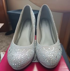 Silver high heel shoes, size 9